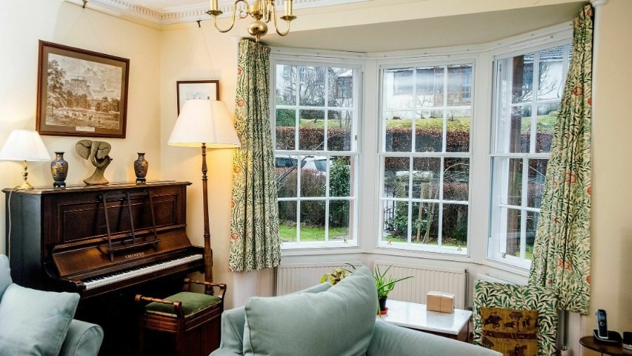 Secondary glazing for a sash and case bay window